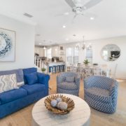 Open living room, dining area and kitchen at Beauty and the Beach near Inlet Beach and 30A