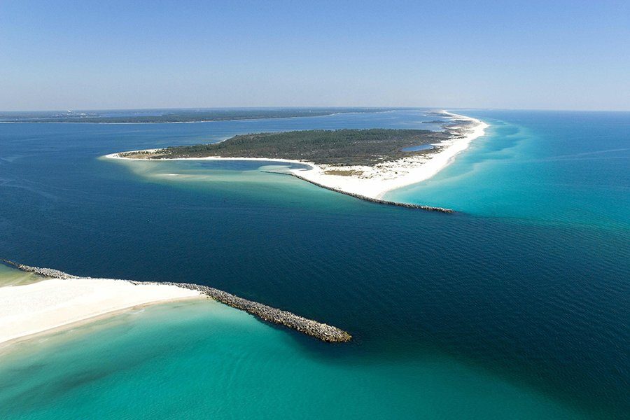 Aerial view of Shell Island, St. Andrews Pass and emerald water near Panama City Beach
